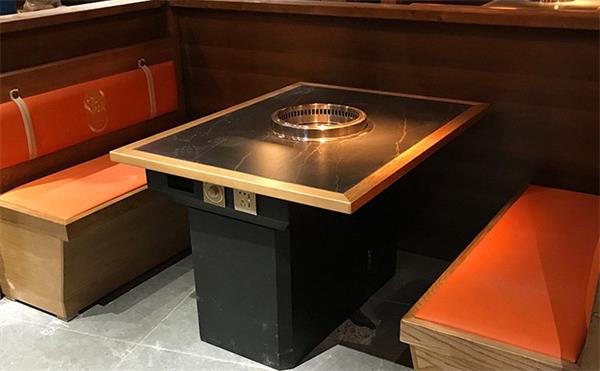 如何根據(jù)烤肉店風(fēng)格和客戶需求來選擇合適的無煙烤肉桌？